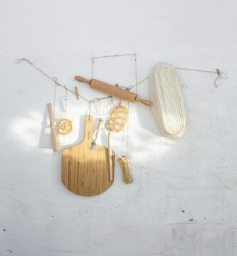 a white wall with various items hanging on it